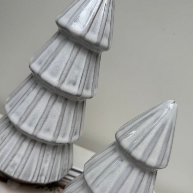 Decorative marble-like trees on a neutral background