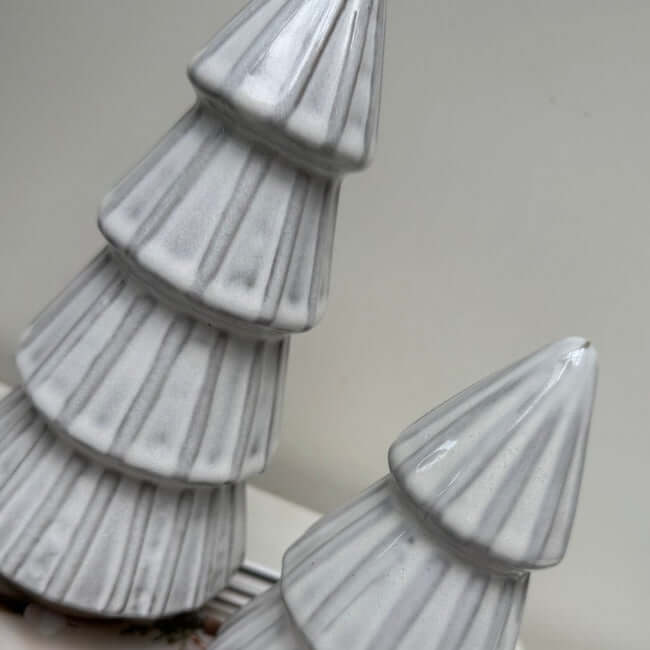 Decorative marble-like trees on a neutral background