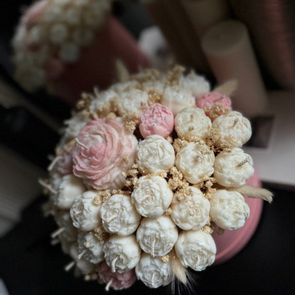 Bouquet of flowers with white and pink peony's on a blurred background