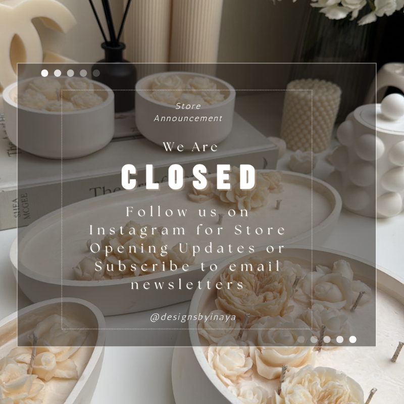Decorative items on a table with a 'Closed' store announcement overlay.
