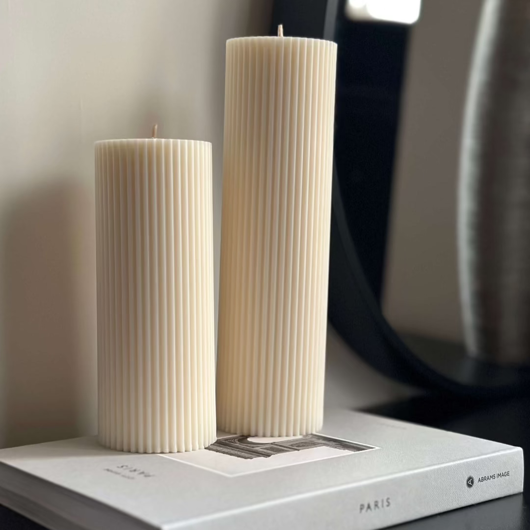 Medium and large ribbed Pillar candle set natural cream colour