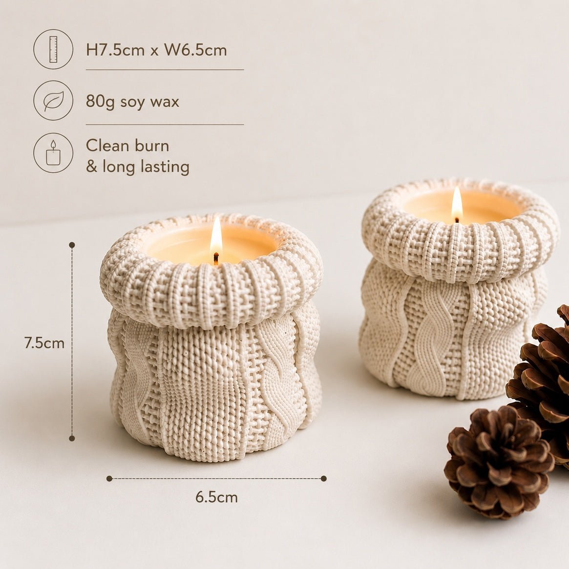 Two off white knitted lit candles, shown on a light neutral background with pinecones and printed size and material information on the left side.