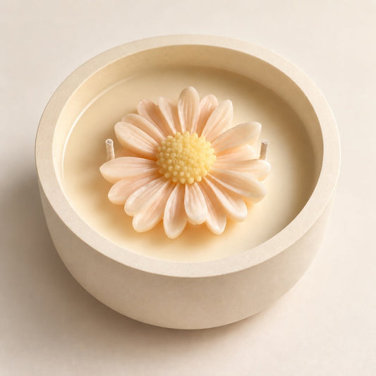 Daisy scented soy candle in handcrafted cream stone vessel with two cotton wicks