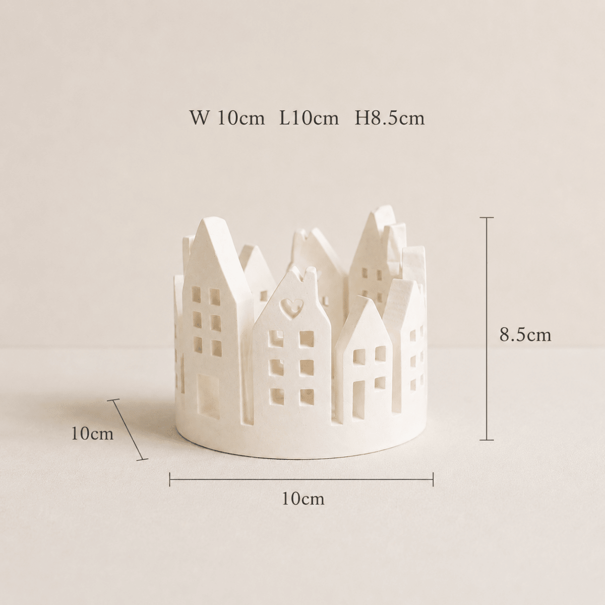 A small white decorative house-shaped candle holder centered on a light beige background, with overlaid dimension labels showing width 10 cm, length 10 cm, and height 8.5 cm.