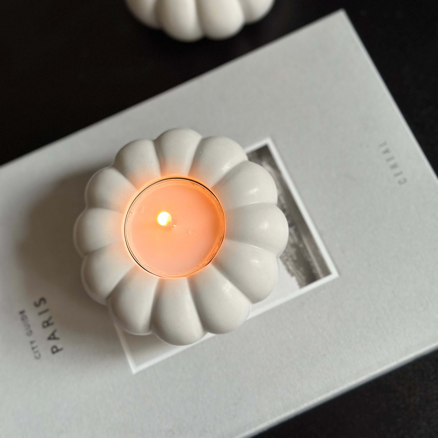 Jesmonite stone pumpkin candle holder showing smooth textured finish