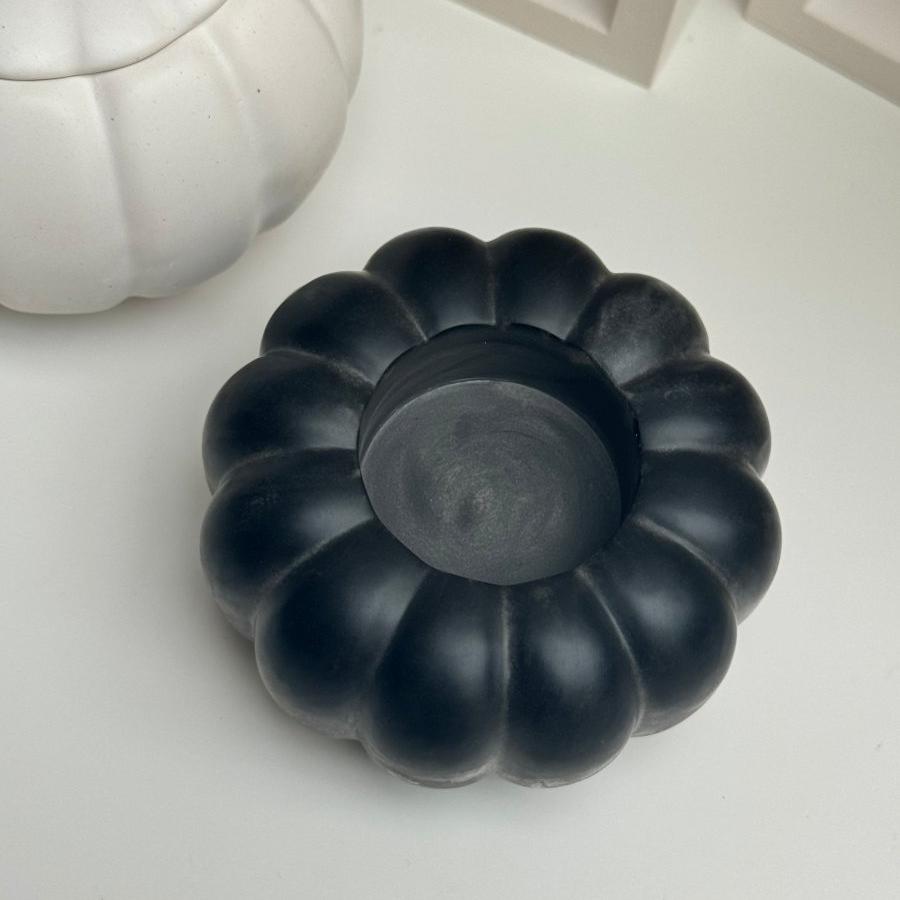 Handmade pumpkin candle holder for minimalist and rustic interiors