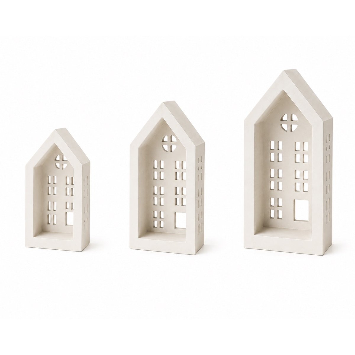 Three small house-shaped decorative objects in different sizes, shown on a clean white background.
