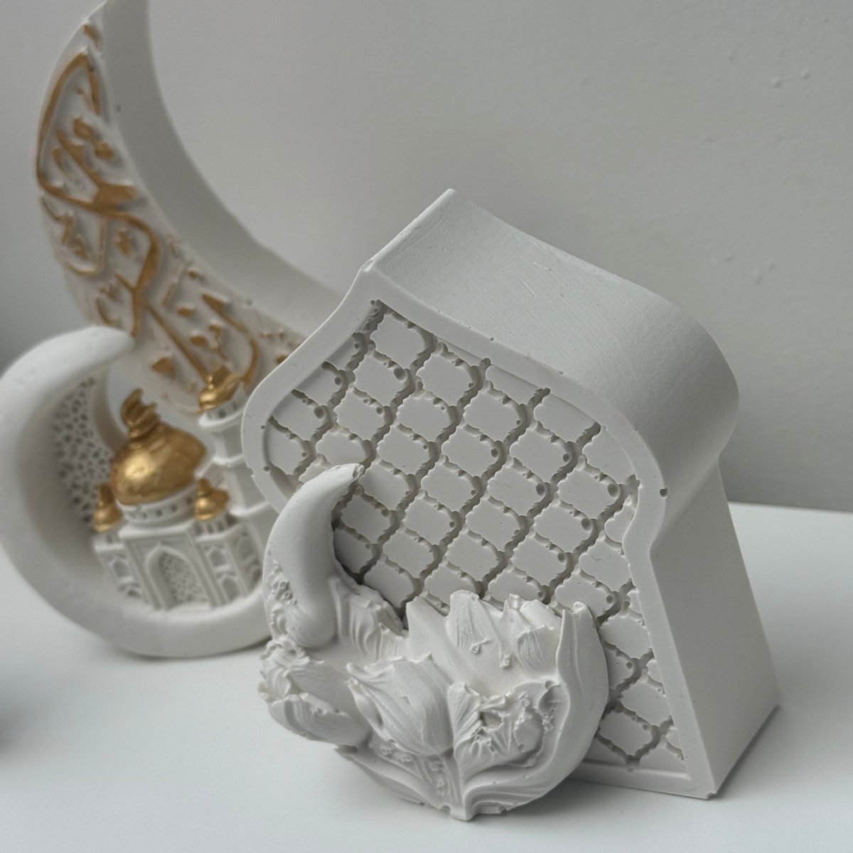 Decorative Ramadan and eid decor with intricate designs on a white background