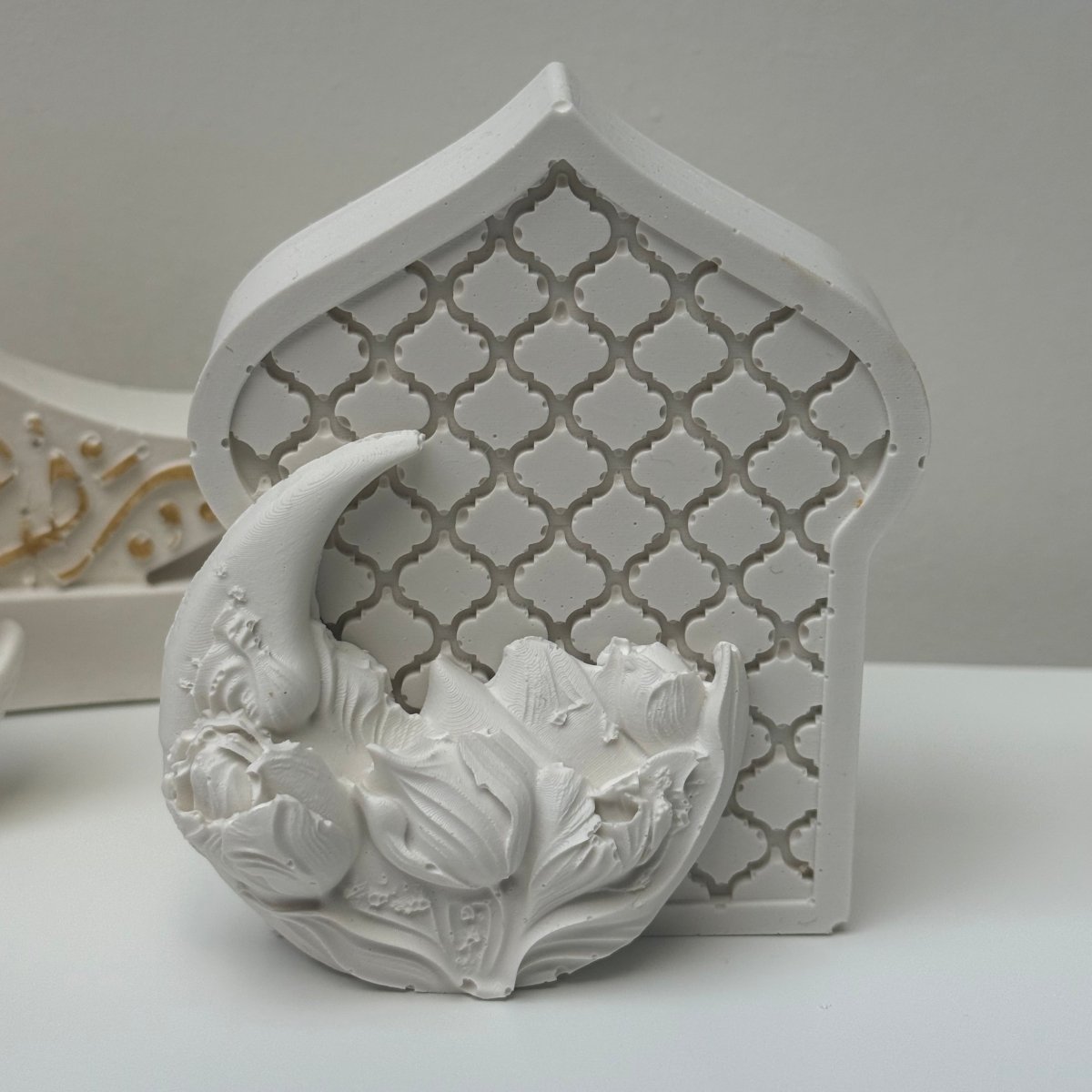 Decorative Ramadan and eid decor with intricate designs on a white background