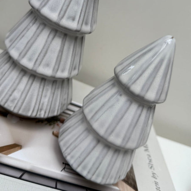 Decorative reactive glaze trees on a neutral background