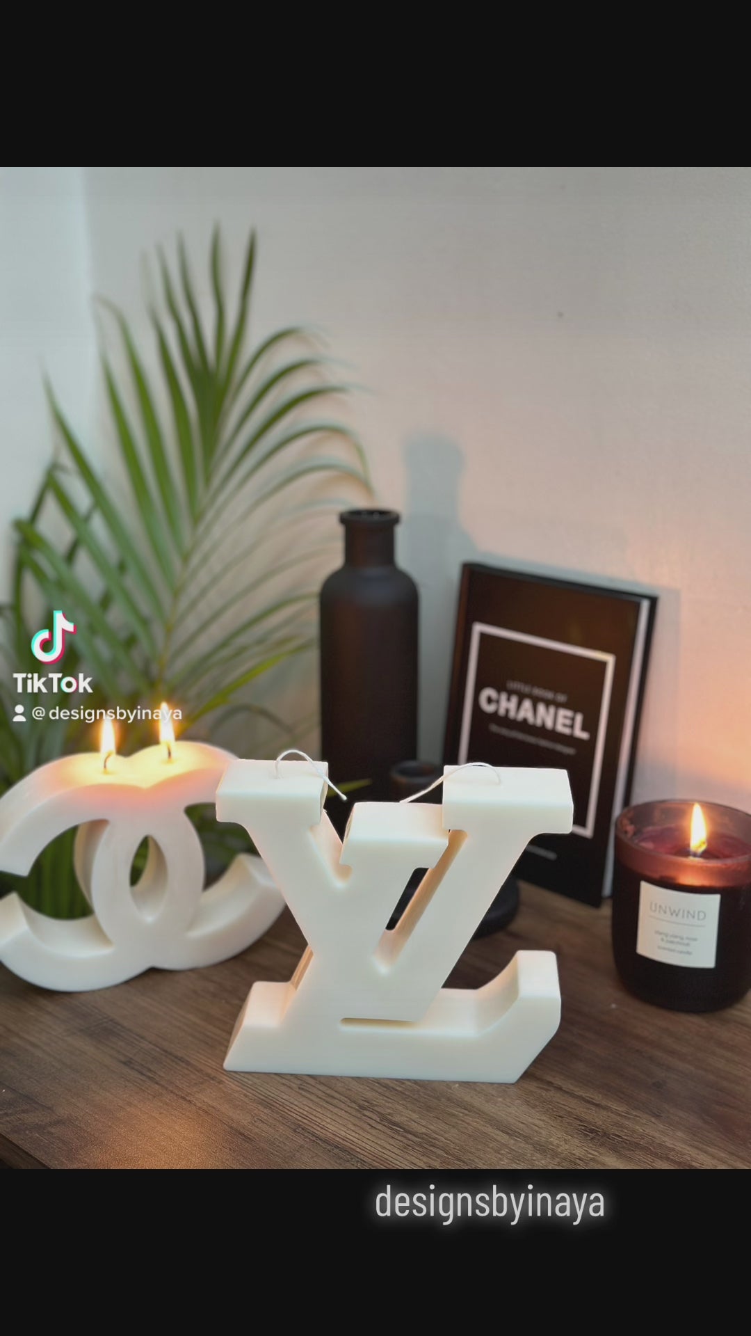 Video of  large logo sculpture candles in cream